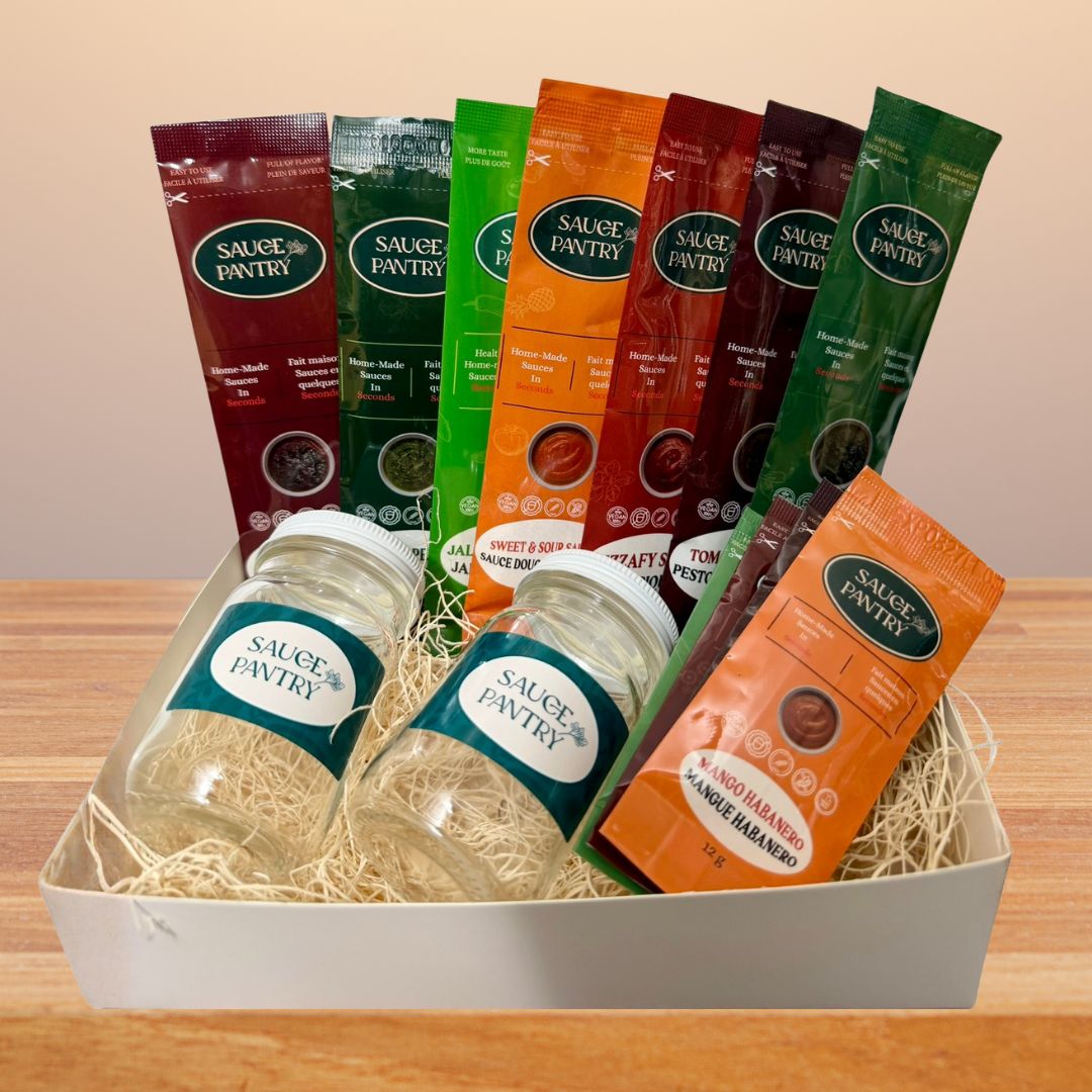 Sauce Pantry product set including packets and bottles on a wooden surface